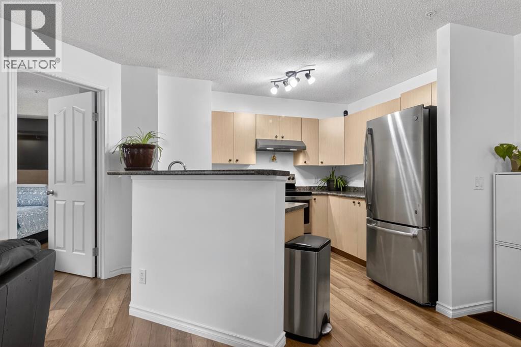 8117, 304 Mackenzie Way SW, Airdrie, Alberta  T4B 2W4 - Photo 8 - A2291901