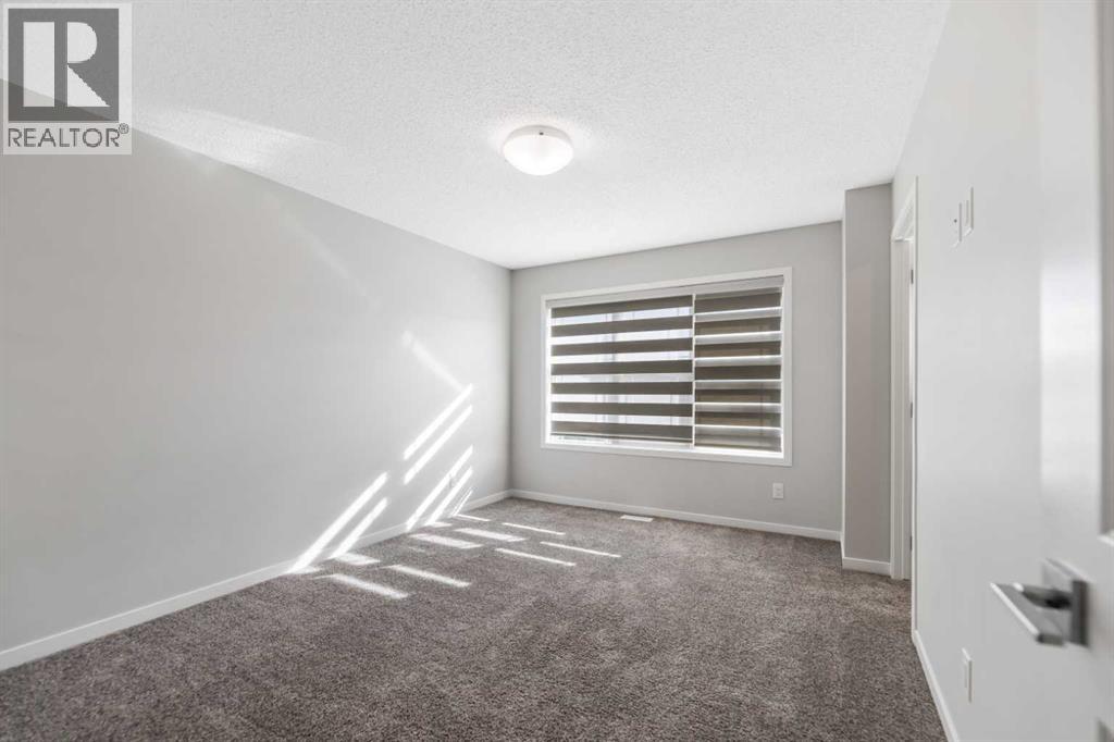 281 Creekside Boulevard SW, Calgary, Alberta  T2X 4X9 - Photo 11 - A2267008