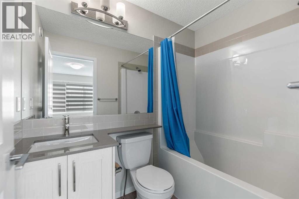 281 Creekside Boulevard SW, Calgary, Alberta  T2X 4X9 - Photo 13 - A2267008