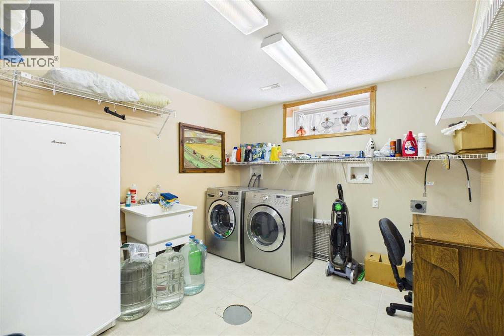 535 Cimarron Point, Okotoks, Alberta  T1S 1S6 - Photo 31 - A2297911