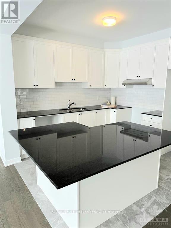 2489 Watercolours Way, Ottawa, Ontario  K2J 7B1 - Photo 5 - X12960310