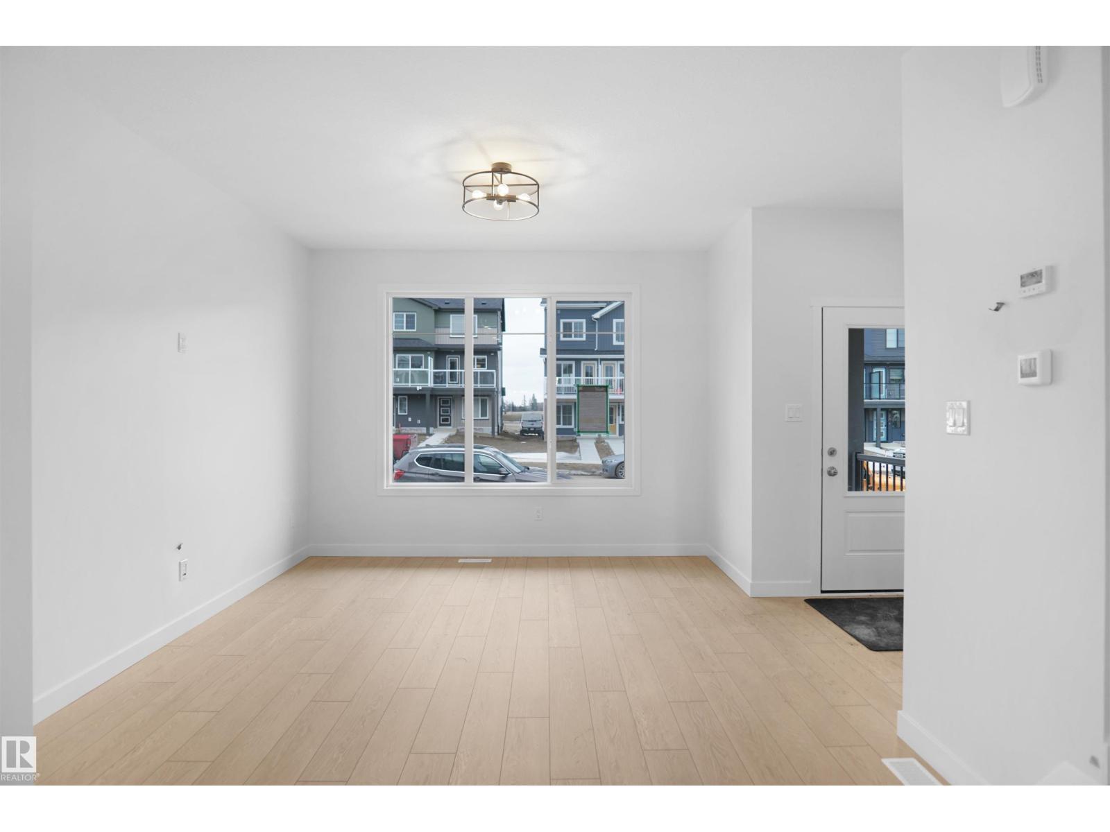 1210 Keswick Dr Sw, Edmonton, Alberta  T6W 4J9 - Photo 4 - E4479602