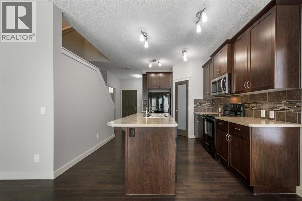 124 Evanscove Manor Nw, Calgary, Alberta  T3P 0E5 - Photo 5 - A2298744