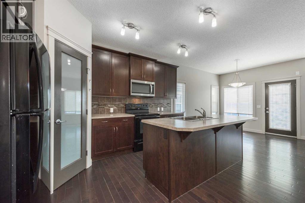 124 Evanscove Manor Nw, Calgary, Alberta  T3P 0E5 - Photo 6 - A2298744