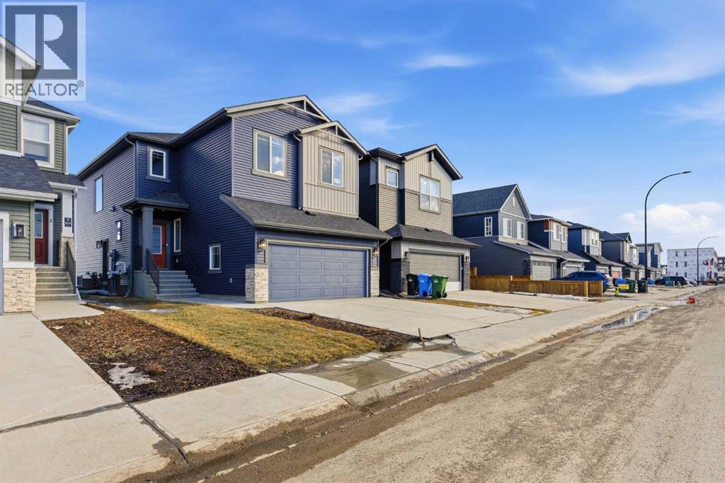 212 Belmont Park SW, Calgary, Alberta  T2X 5T7 - Photo 2 - A2294077