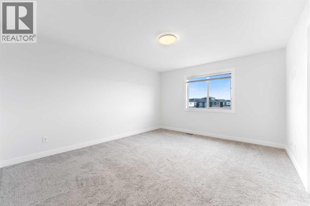 212 Belmont Park SW, Calgary, Alberta  T2X 5T7 - Photo 22 - A2294077