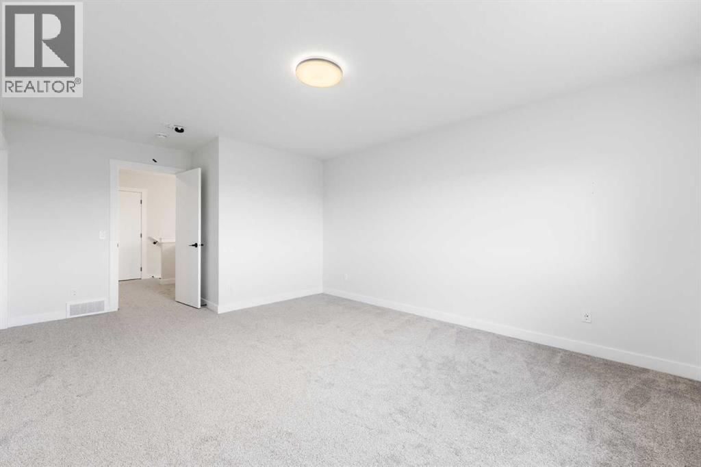 212 Belmont Park SW, Calgary, Alberta  T2X 5T7 - Photo 23 - A2294077