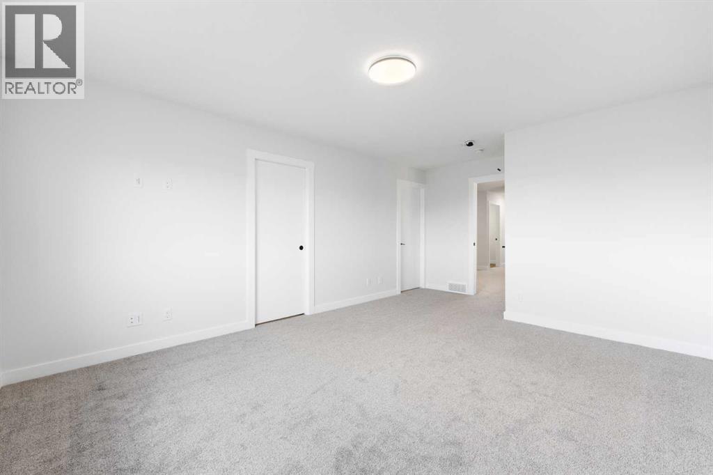 212 Belmont Park SW, Calgary, Alberta  T2X 5T7 - Photo 24 - A2294077