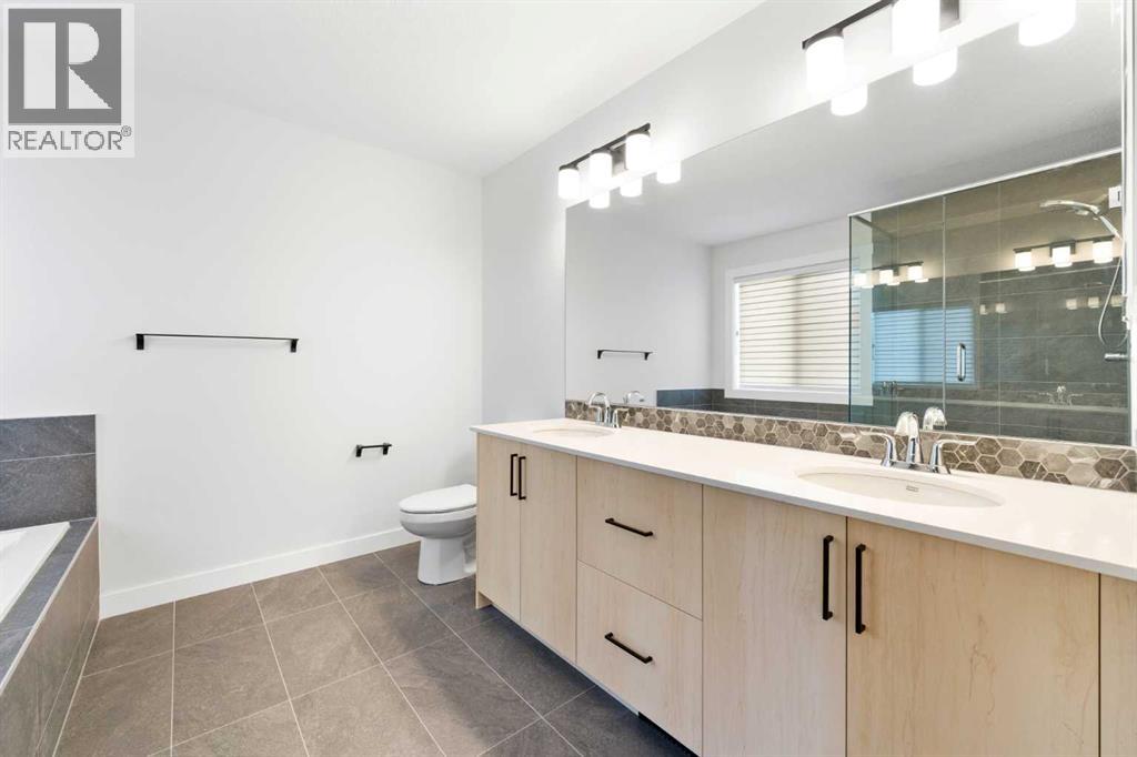 212 Belmont Park SW, Calgary, Alberta  T2X 5T7 - Photo 25 - A2294077