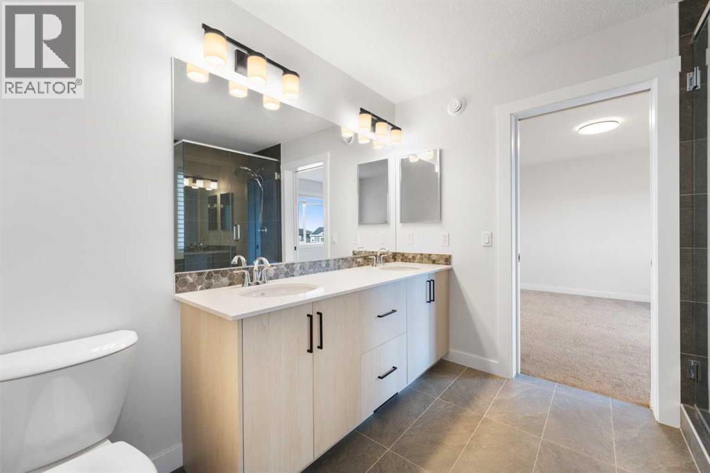 212 Belmont Park SW, Calgary, Alberta  T2X 5T7 - Photo 27 - A2294077