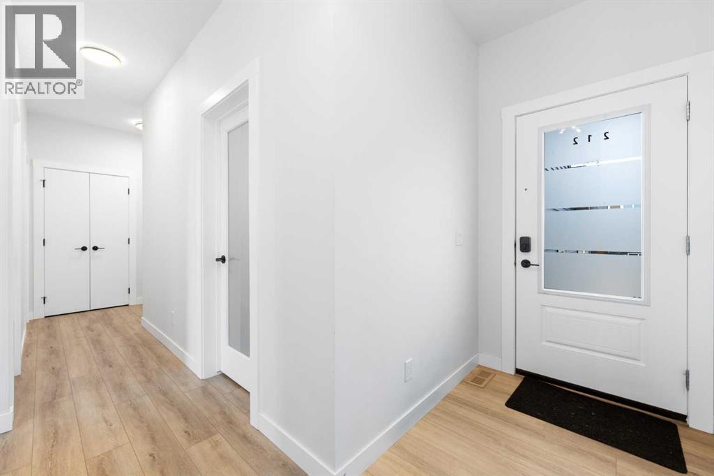212 Belmont Park SW, Calgary, Alberta  T2X 5T7 - Photo 3 - A2294077
