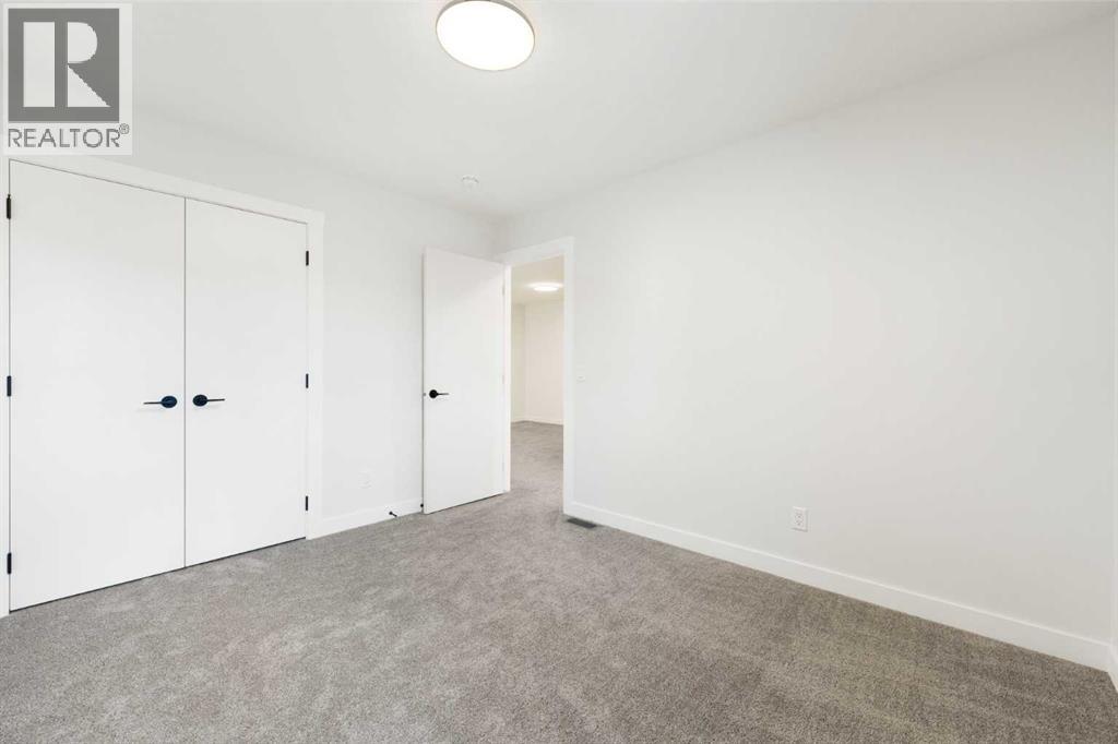 212 Belmont Park SW, Calgary, Alberta  T2X 5T7 - Photo 30 - A2294077