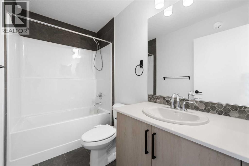 212 Belmont Park SW, Calgary, Alberta  T2X 5T7 - Photo 36 - A2294077