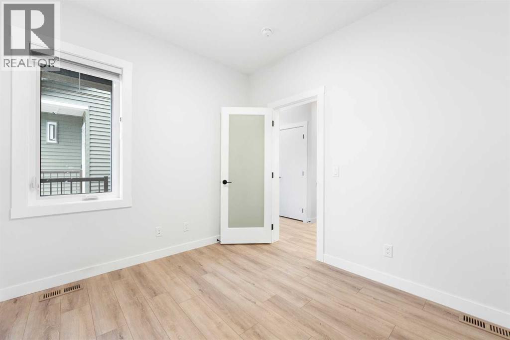 212 Belmont Park SW, Calgary, Alberta  T2X 5T7 - Photo 6 - A2294077