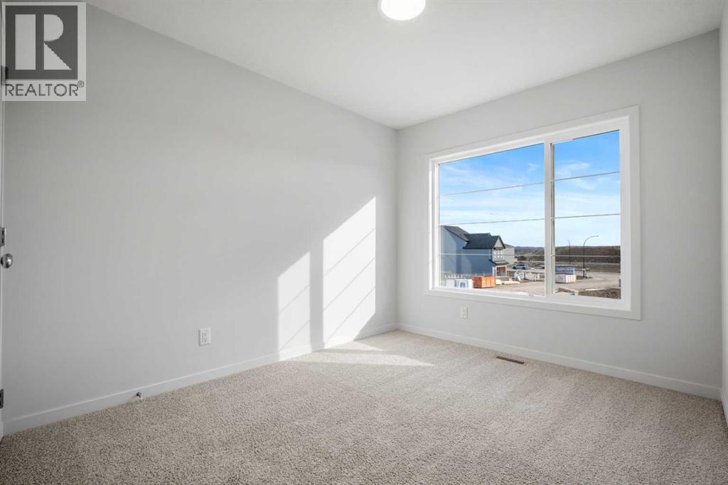 118 Wolf Hollow Terrace Se, Calgary, Alberta  T2X 6C5 - Photo 34 - A2288423