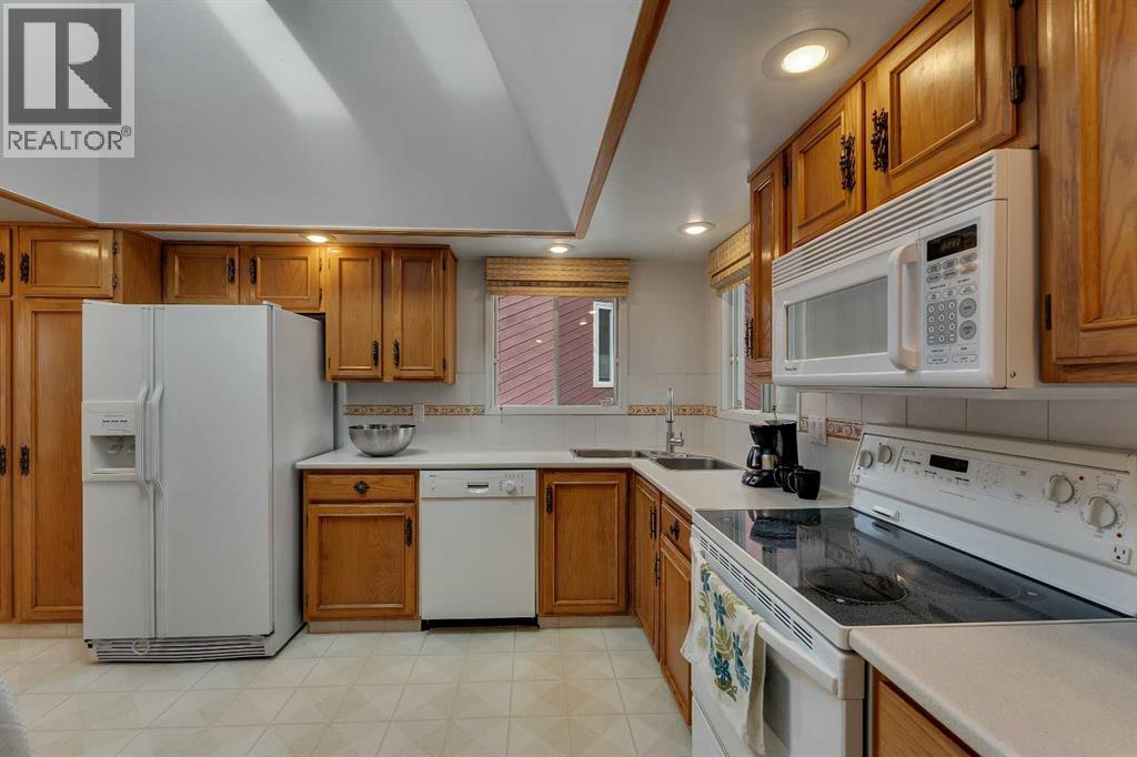 20 Woodbrook Place Sw, Calgary, Alberta  T2W 3Z4 - Photo 7 - A2290893