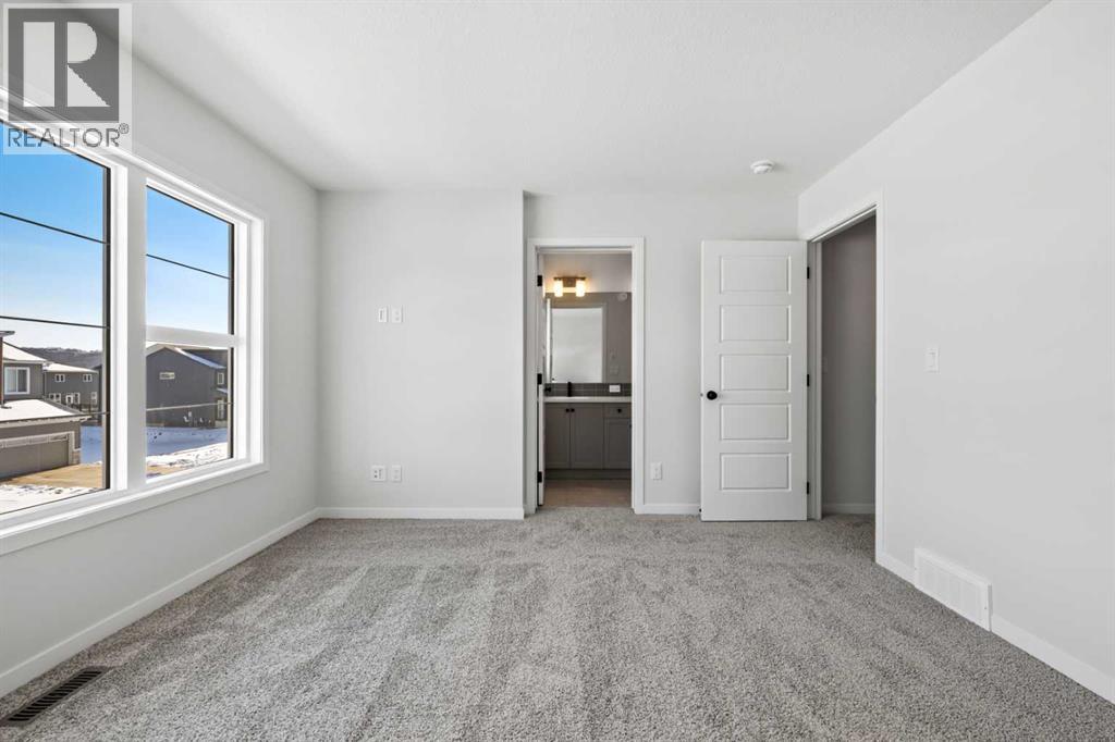 114 Wolf Hollow Terrace SE, Calgary, Alberta  T2X 6C5 - Photo 26 - A2297726