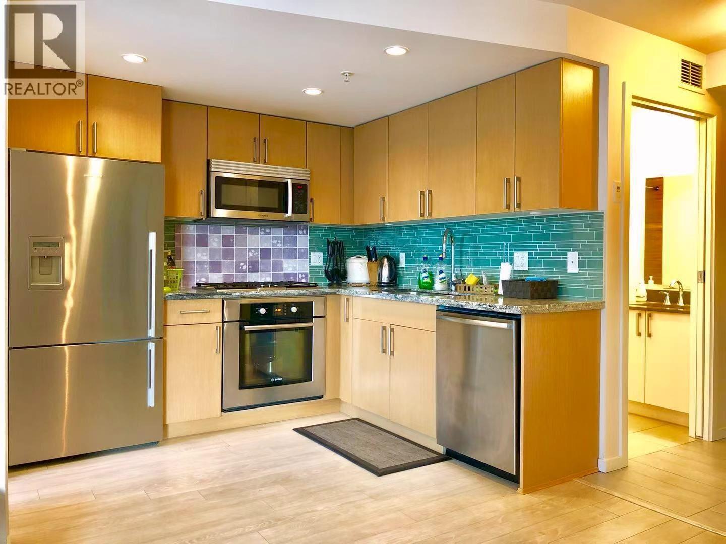 613 1887 Crowe Street, Vancouver, British Columbia  V5Y 0B4 - Photo 1 - R3107050