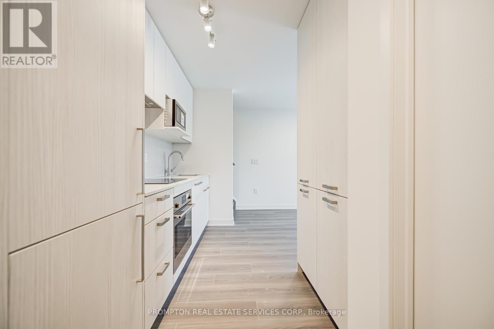 202 - 65 Curlew Drive, Toronto, Ontario  M3A 0B5 - Photo 4 - C12961184