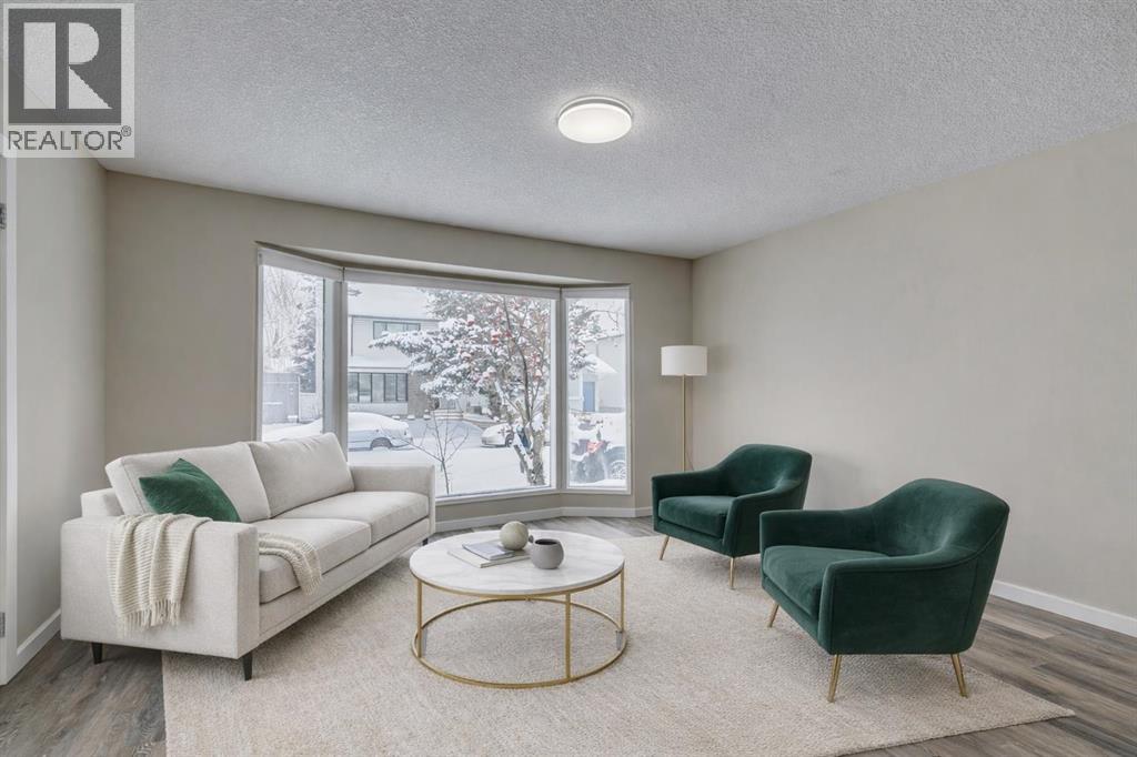 68 Woodglen Close Sw, Calgary, Alberta  T2W 4N1 - Photo 4 - A2274552