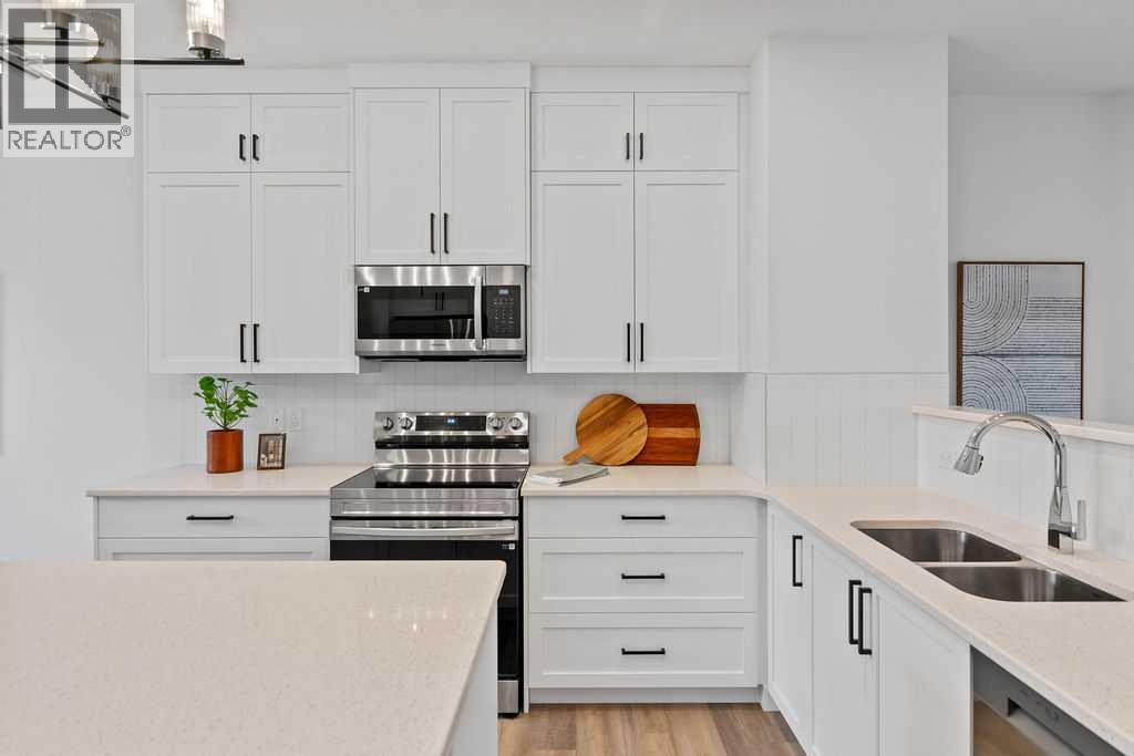 1037 Reynolds Crescent Sw, Airdrie, Alberta  T4B 5L8 - Photo 7 - A2201126