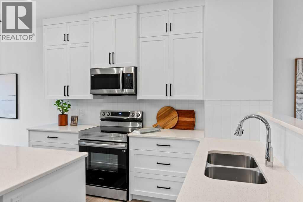 1037 Reynolds Crescent Sw, Airdrie, Alberta  T4B 5L8 - Photo 8 - A2201126