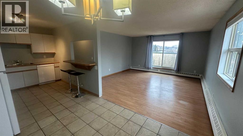 8, 6203 Bowness Road NW, Calgary, Alberta  T3B 0E2 - Photo 3 - A2296202