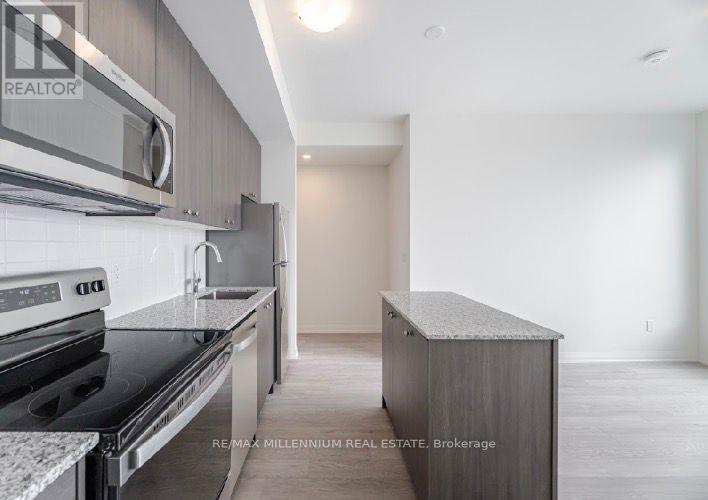 1207 - 3006 William Cutmore Boulevard, Oakville, Ontario  L6H 8A4 - Photo 4 - W12917120