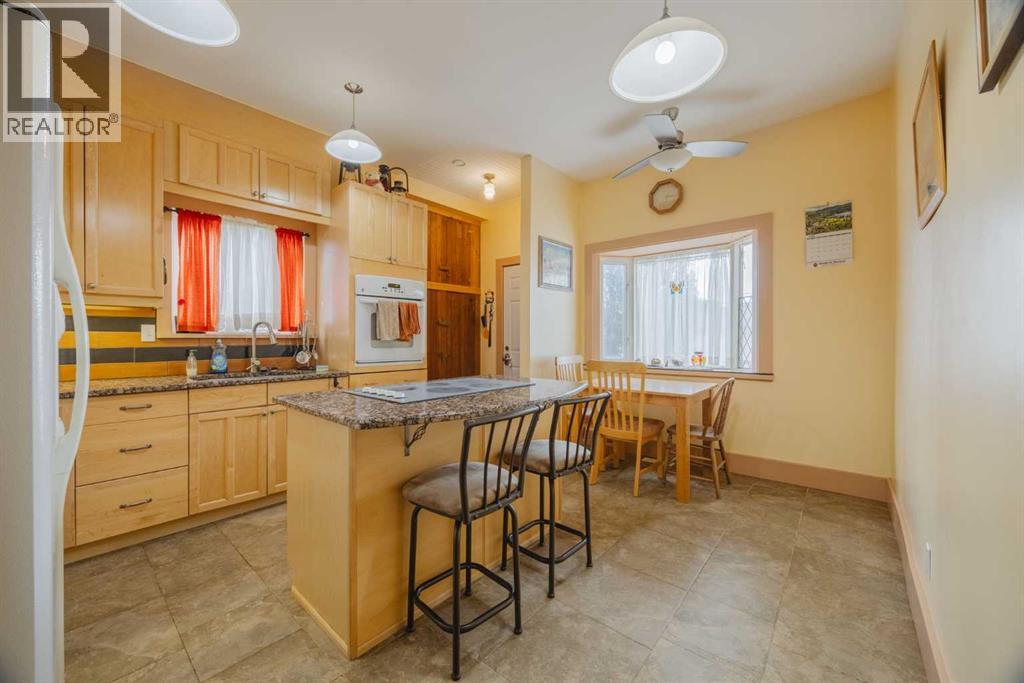 15 Elma Street W, Okotoks, Alberta  T1S 1J7 - Photo 12 - A2241158