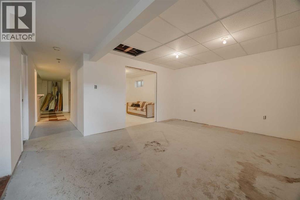 15 Elma Street W, Okotoks, Alberta  T1S 1J7 - Photo 25 - A2241158