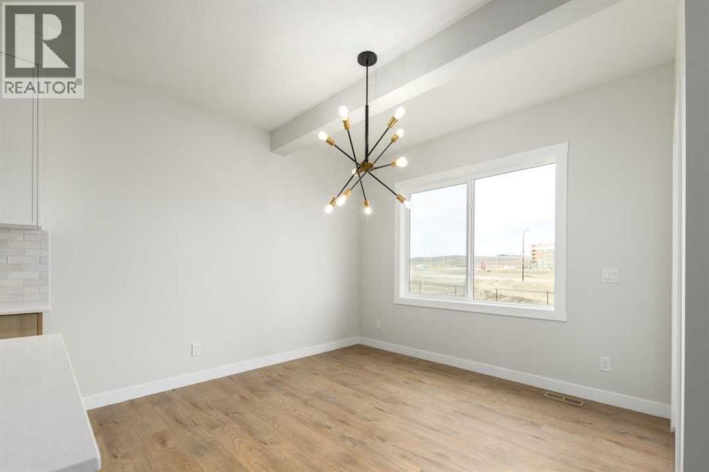 126 Drystone Way Nw, Calgary, Alberta  T3R 2L9 - Photo 6 - A2280923