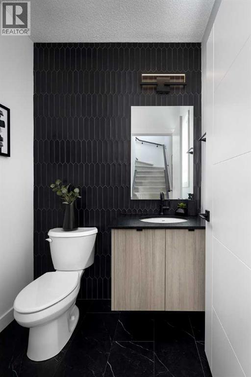 86 Creekview Avenue, Calgary, Alberta  T2X 4Y1 - Photo 2 - A2282352