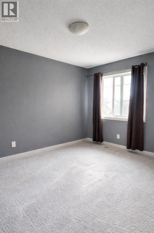 1580 New Brighton Drive SE, Calgary, Alberta  T2Z 0P8 - Photo 21 - A2293990