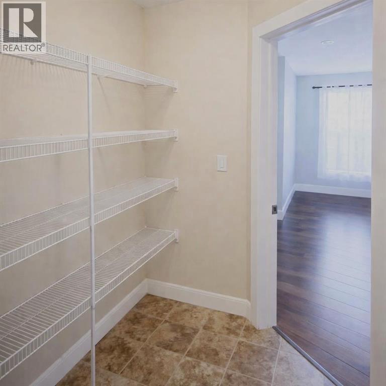 1580 New Brighton Drive SE, Calgary, Alberta  T2Z 0P8 - Photo 10 - A2293990