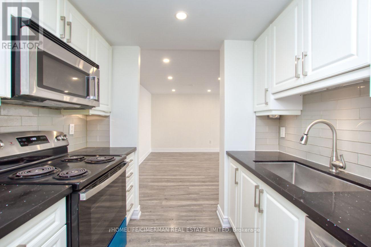 1511 - 320 Dixon Road, Toronto, Ontario  M9R 1S8 - Photo 5 - W12961894