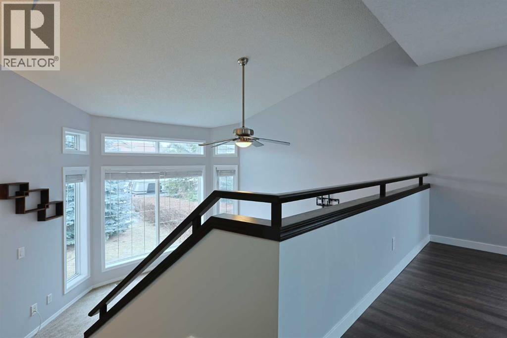 19 Sunridge Crescent NW, Airdrie, Alberta  T4B 2G6 - Photo 7 - A2282964
