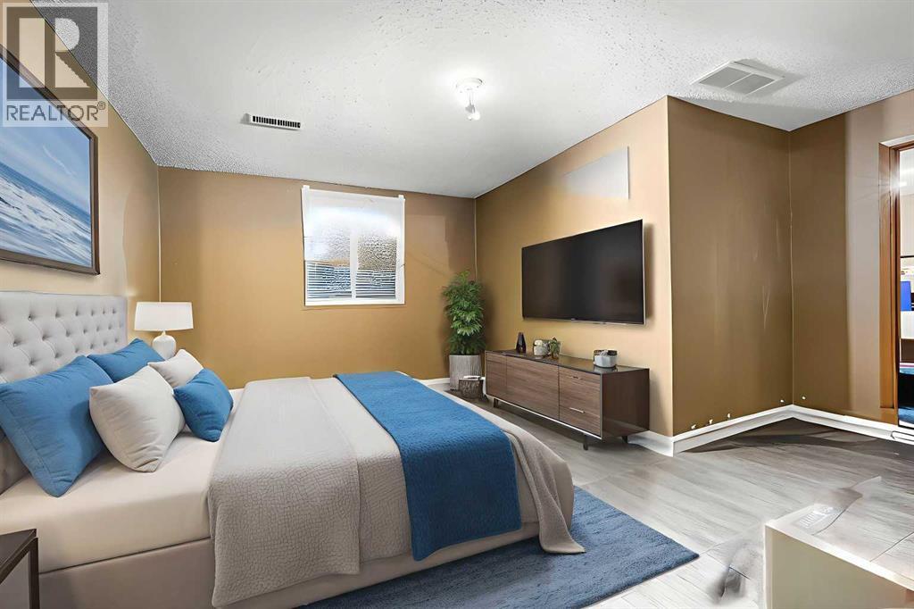 1016 Hunterdale Place NW, Calgary, Alberta  T2Z 4R7 - Photo 28 - A2279676