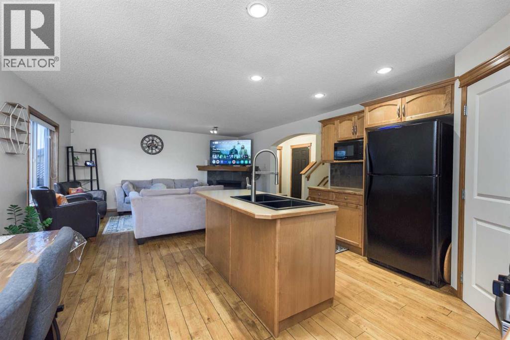 74 Tuscany Springs Hill NW, Calgary, Alberta  T3L 3E4 - Photo 6 - A2286017