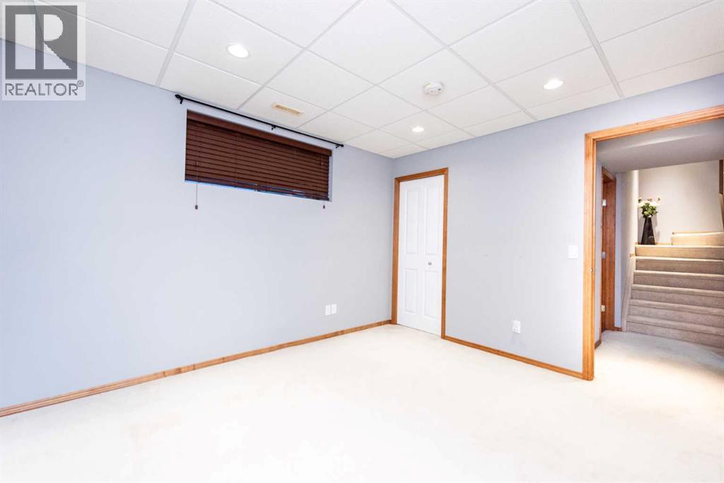 74 Tuscany Springs Hill NW, Calgary, Alberta  T3L 3E4 - Photo 31 - A2286017
