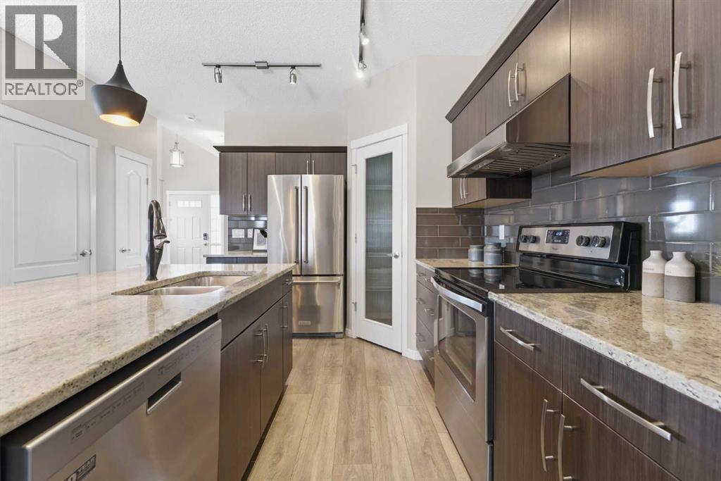 413 Nolanfield Way NW, Calgary, Alberta  T3R 0L8 - Photo 6 - A2298389