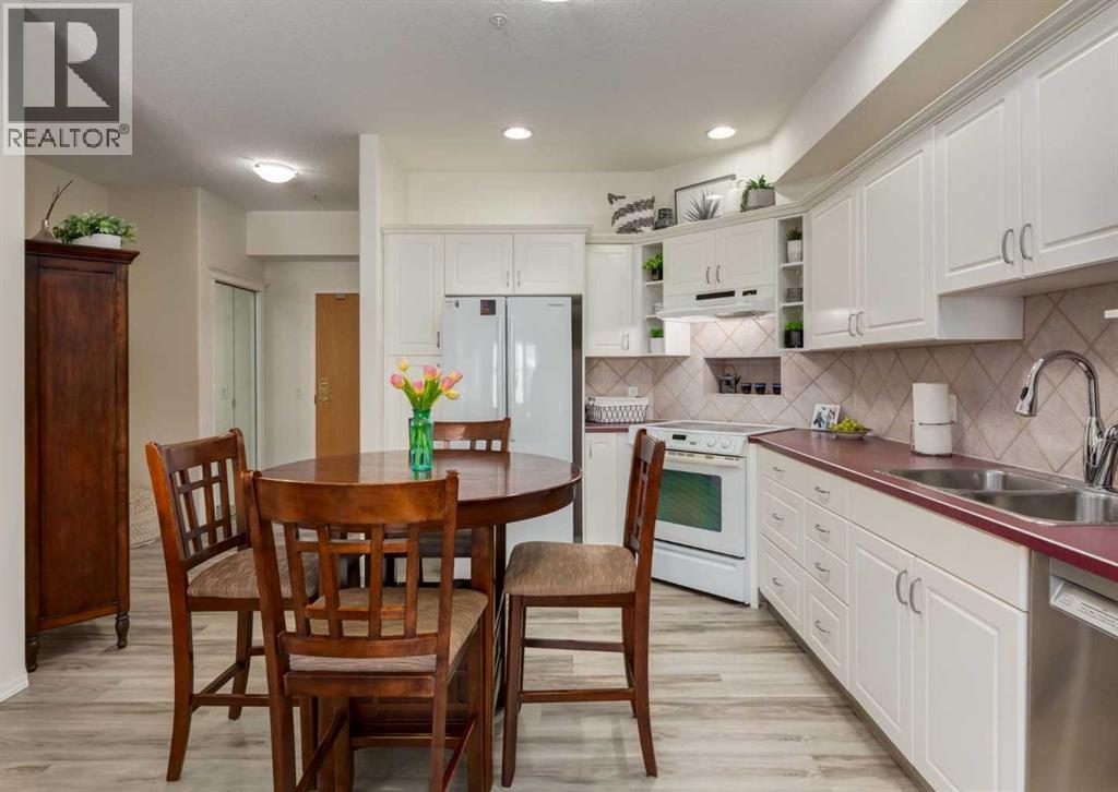 219, 223 Tuscany Springs Boulevard NW, Calgary, Alberta  T3L 2M2 - Photo 4 - A2297667