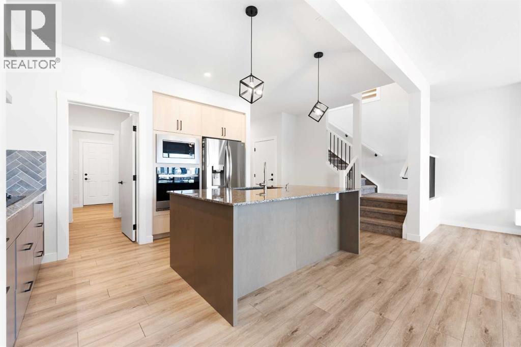 212 Belmont Park Sw, Calgary, Alberta T2X 5T7 - Photo 9 - A2294077