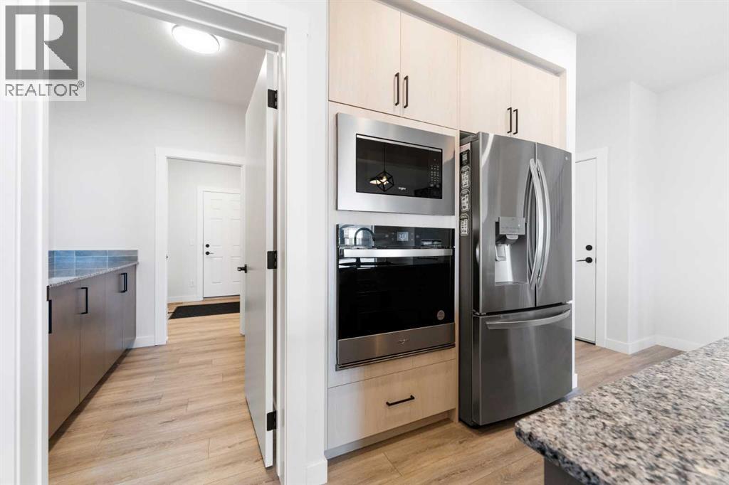 212 Belmont Park Sw, Calgary, Alberta T2X 5T7 - Photo 11 - A2294077