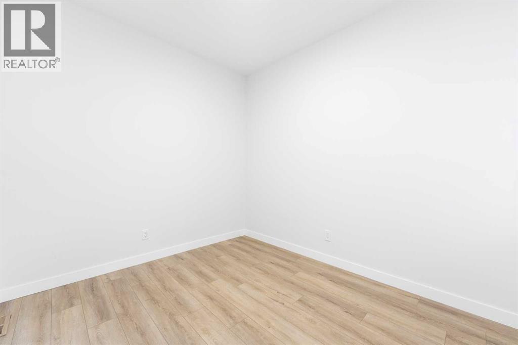 212 Belmont Park Sw, Calgary, Alberta T2X 5T7 - Photo 5 - A2294077