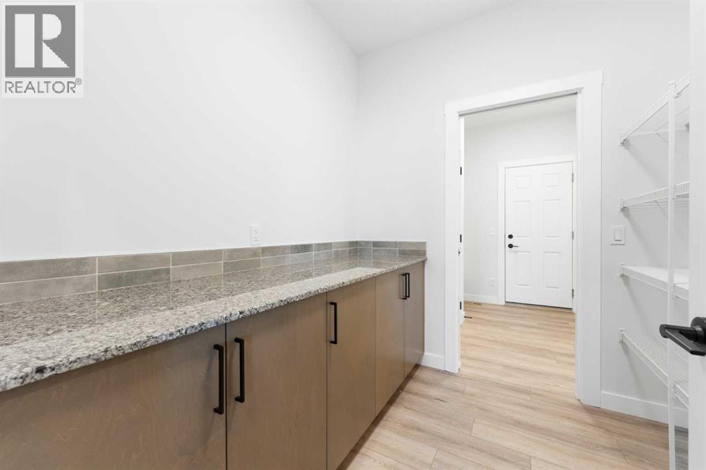 212 Belmont Park Sw, Calgary, Alberta T2X 5T7 - Photo 13 - A2294077