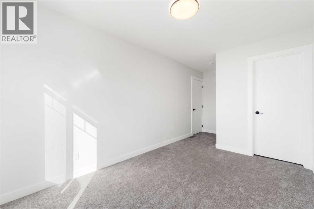212 Belmont Park Sw, Calgary, Alberta T2X 5T7 - Photo 32 - A2294077