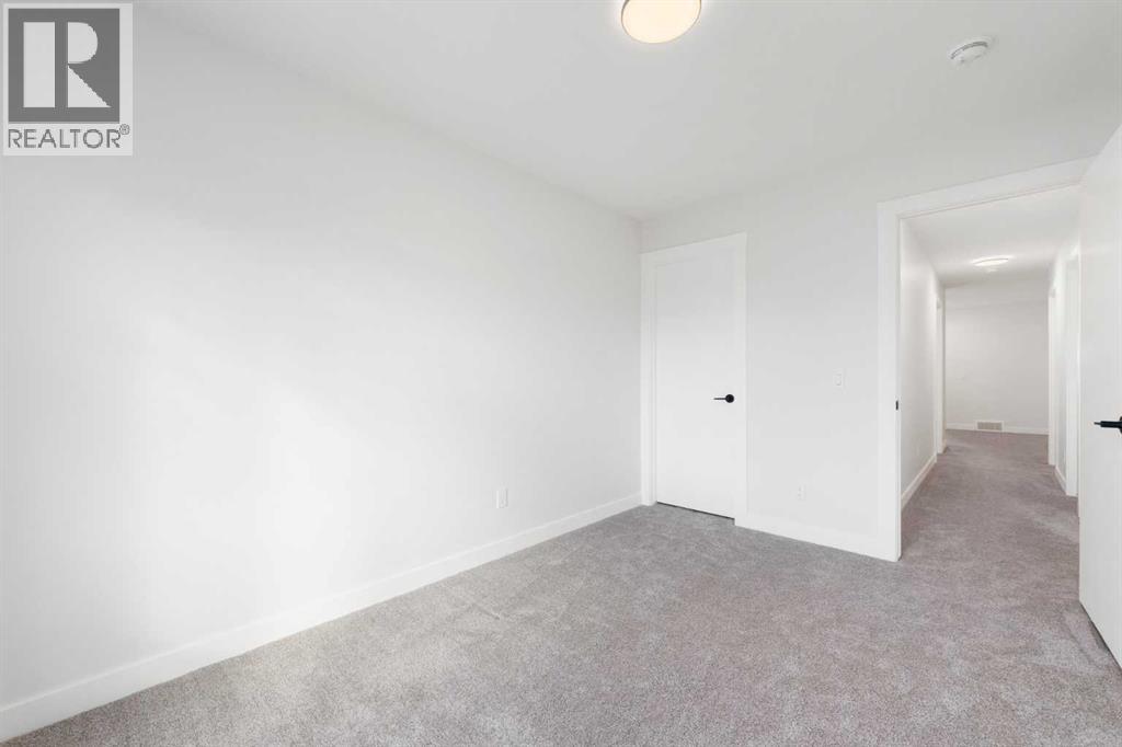 212 Belmont Park Sw, Calgary, Alberta T2X 5T7 - Photo 34 - A2294077