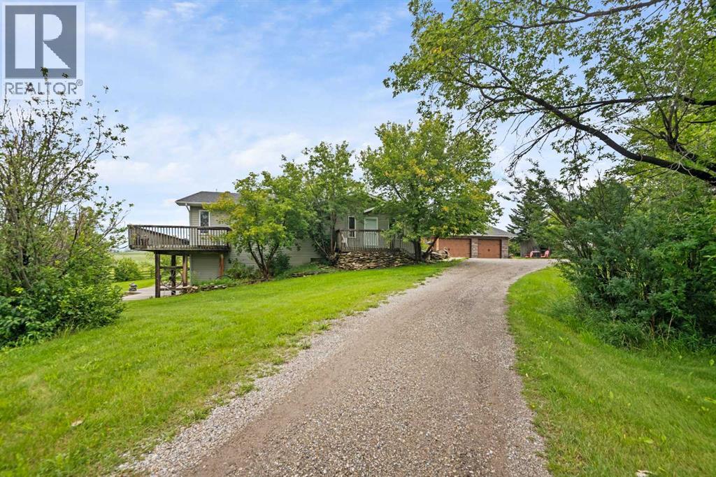 33194 Twp Rd 284, Rural Rocky View County, Alberta  T0M 1L0 - Photo 2 - A2293807