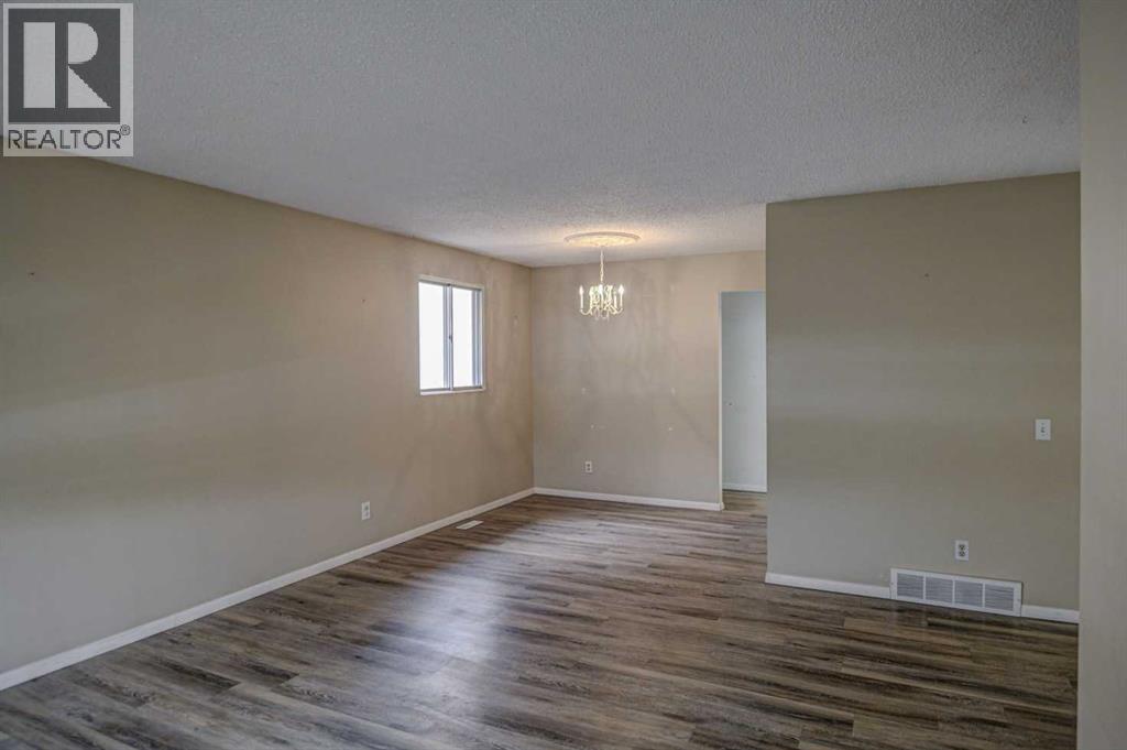 12120 Lake Michigan Road SE, Calgary, Alberta  T2J 3G3 - Photo 3 - A2298858