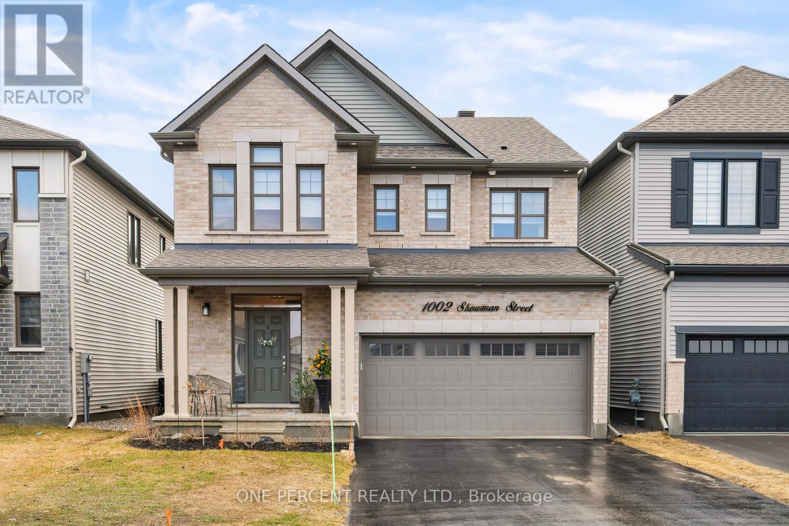 Finished like a showhome on a premium ravine lot with no rear neighbours, this Mattamy Sycamore delivers over 2,400 sq. ft. of above-grade living where no detail was overlooked. For families who want a home that turns heads and functions effortlessly, this one delivers: an open-concept layout, beautiful finishes, and the kind of style most people only see in magazines. The main floor flows naturally from a spacious dining room into a cozy living room with a stylish shiplap fireplace, abundant natural light, and in-ceiling speakers. The kitchen is a true focal point, built for those who value beauty as much as function: two-tone cabinetry, a waterfall island with a black granite sink and seating for four, a herringbone tile backsplash, quartz countertops, stainless steel appliances including an induction cooktop, and a double-door pantry. Oversized patio doors extend the space outdoors to a private, landscaped, fully fenced yard with a large interlock patio and gas BBQ hookup, made for entertaining. A vaulted loft with a built-in den gives the upper level a sense of space most homes this size simply don't have. The primary suite is a true retreat, with an oversized walk-in closet and a spa-inspired four-piece ensuite featuring double undermount sinks, quartz countertops, and a glass-enclosed shower. Two additional bedrooms, a well-appointed four-piece main bath, and an upper-level laundry room complete the floor. The fully finished basement extends the living space with a large rec room, a dedicated gym, a roughed-in bath, and plenty of storage. All of this, set in Fox Run just steps from the park, where Richmond's small-town charm and easy access to Ottawa offer the best of both worlds. Check out the virtual tour and book your private showing today. (id:48254)